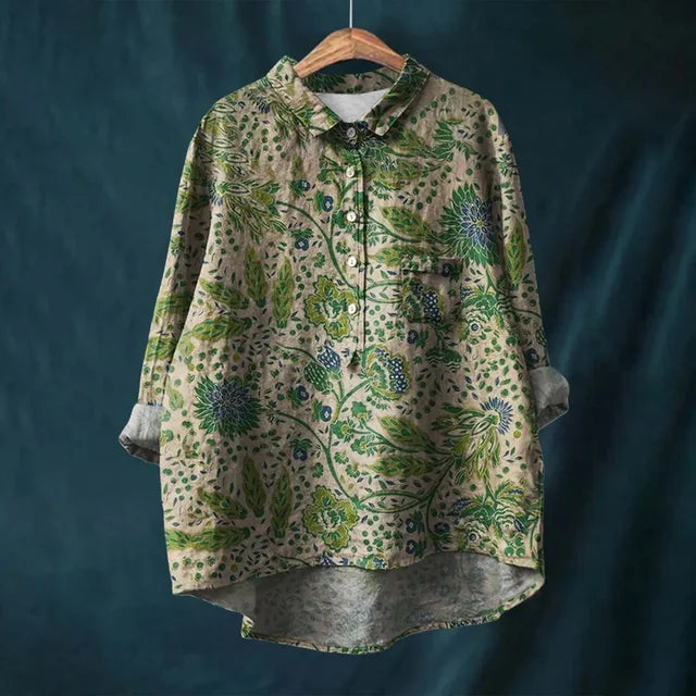 Women's blooming floral long-sleeve blouse. Vibrant print lightweight top, ideal for summer casual fashion.