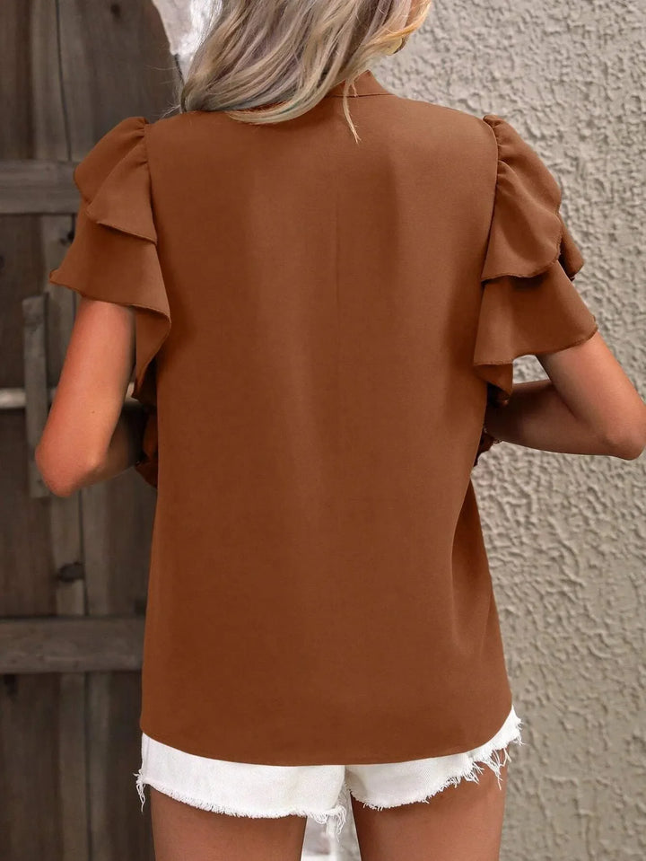 Summer fashion women's ruffled short sleeve blouse, a lightweight and airy casual top.