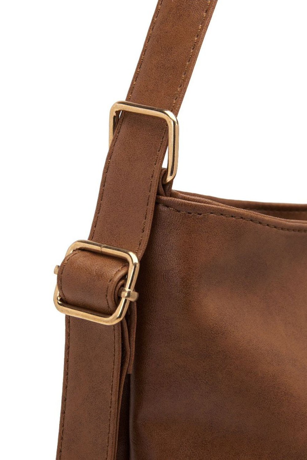 Durable women's chocolate PU leather shoulder tote bag. Spacious, perfect for everyday carry or a professional work bag.