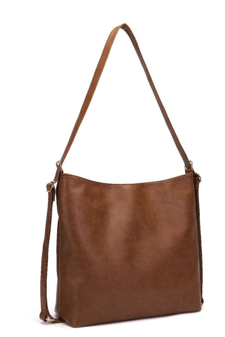 Stylish women's chocolate PU leather tote bag. A versatile large shoulder bag perfect for work or casual daily use.