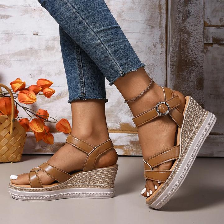 Chic women's platform wedge sandals, designed for effortless elegance & comfortable elevated summer style.