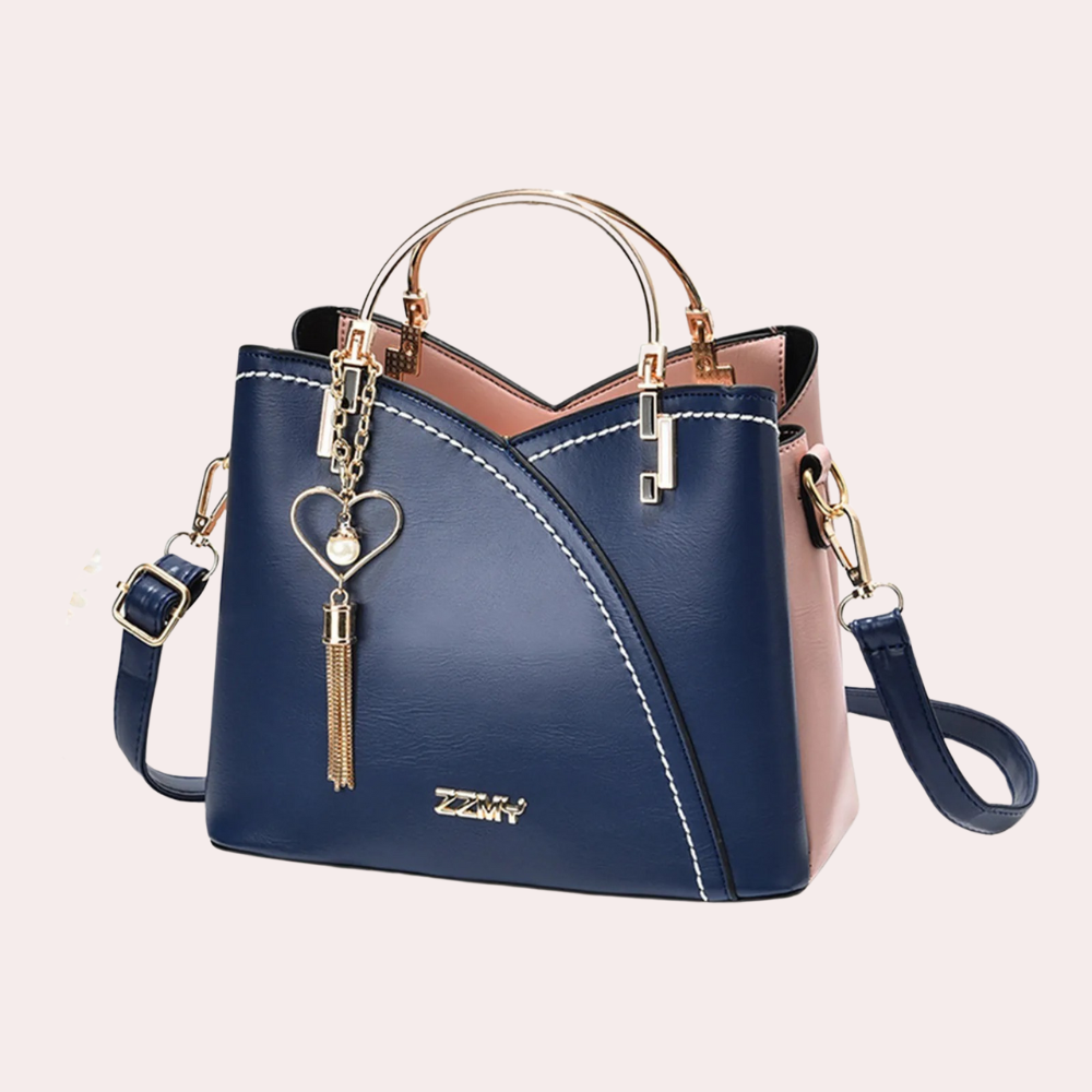 Chic women's geometric shoulder bag, convertible to crossbody with metallic accents and multi-pockets.