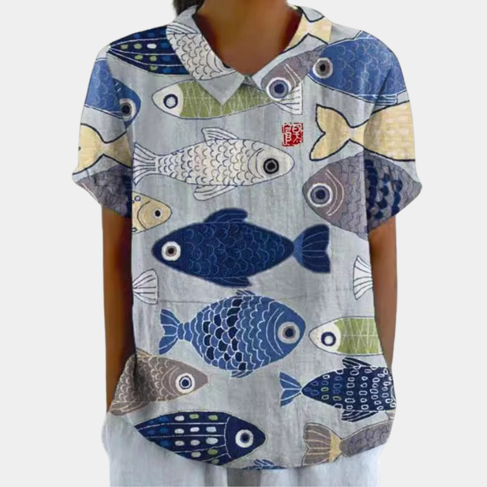 Lightweight women's short sleeve floral top with Peter Pan collar, a stylish and comfortable fashion shirt for summer.