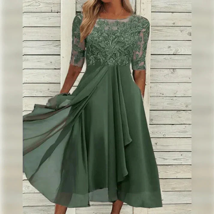 Women's elegant long sleeve dress for fall. Classy, sophisticated style perfect for parties & occasion wear in a rich blue.