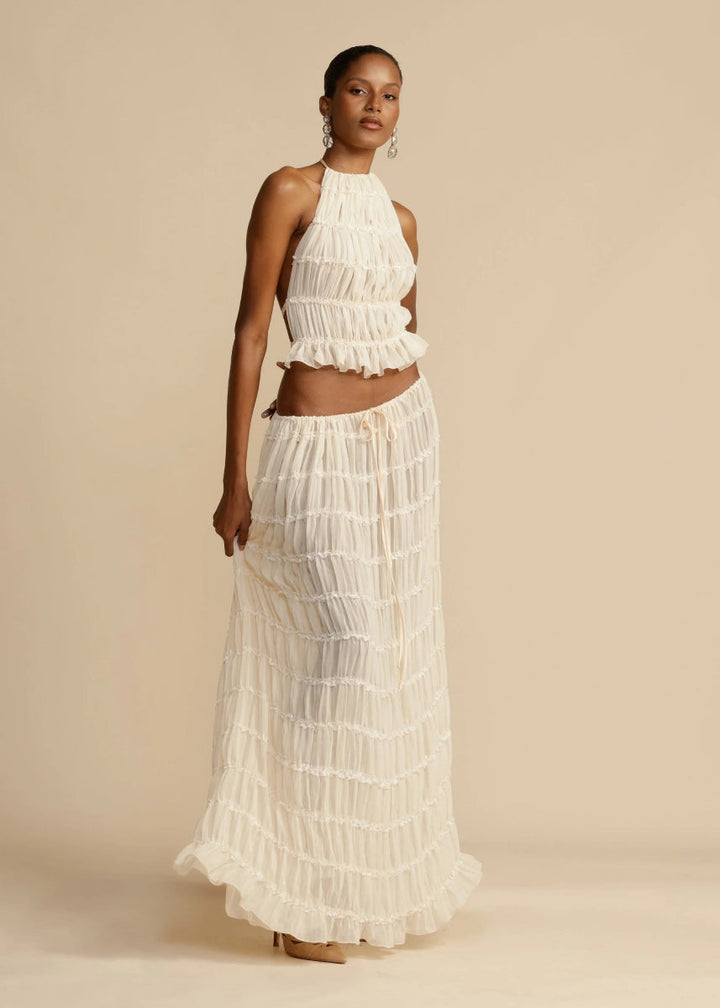 Elegant women's two-piece summer set with a stylish halter top & breathable maxi skirt, great for resort & beach.