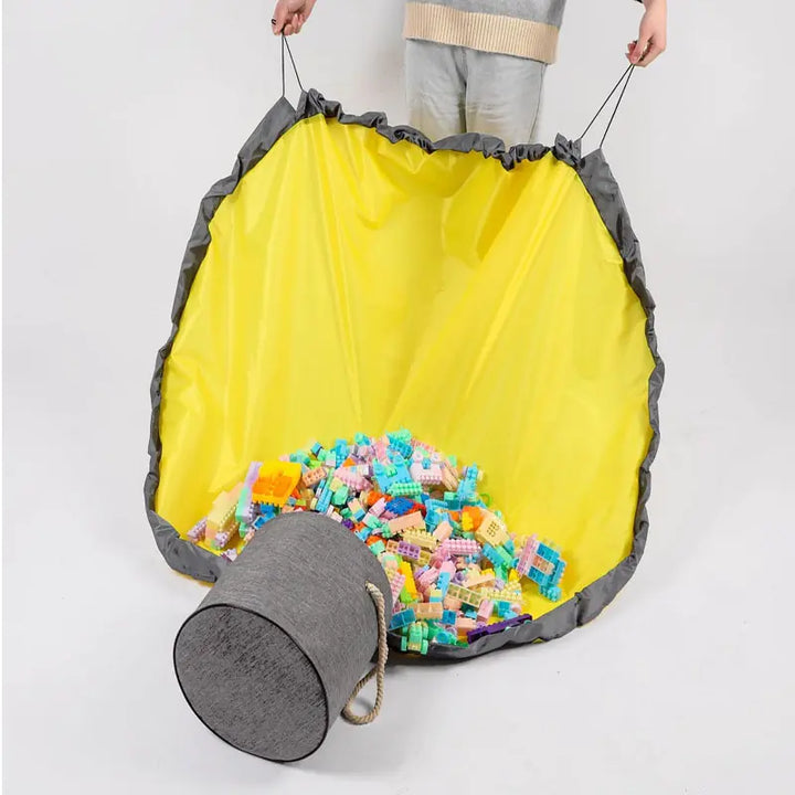 Smart storage solution: a circular play mat that converts to a toy storage bag for children.