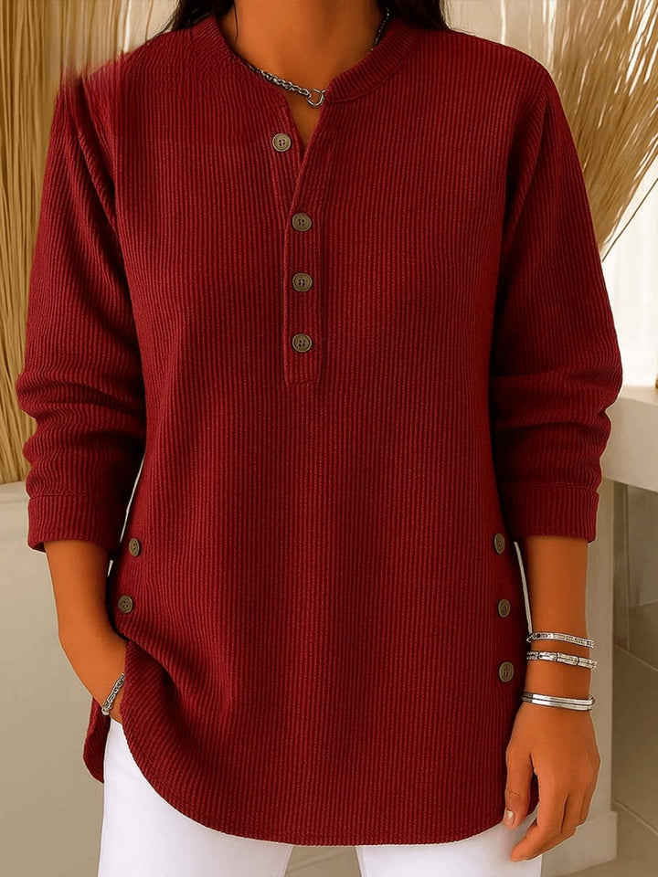 Cozy women's ribbed Henley tunic with button front, comfortable everyday style, ideal for layering.