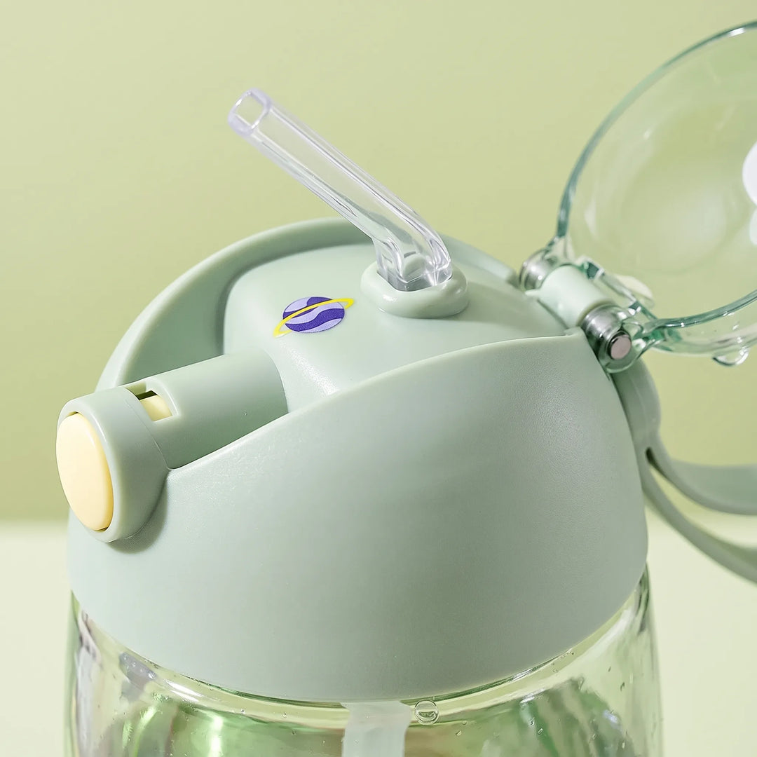 Kids' dinosaur-themed water bottle with a convenient integrated straw for spill-proof sipping.