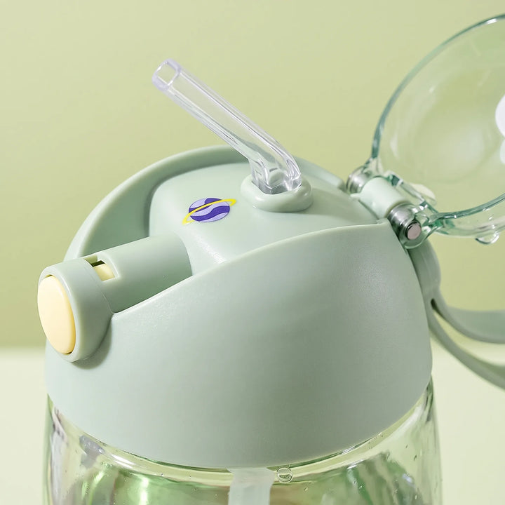 Kids' dinosaur-themed water bottle with a convenient integrated straw for spill-proof sipping.