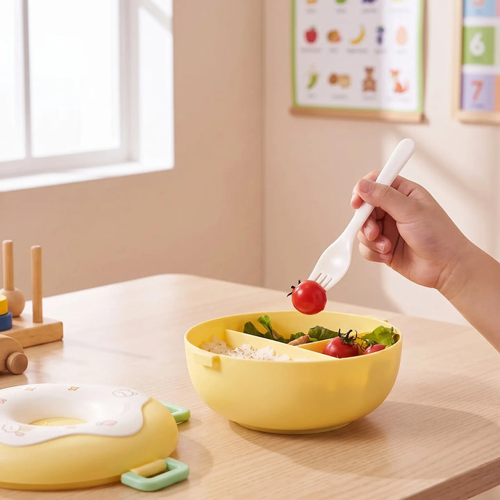 Cute doughnut kids lunch box for school, features multiple compartments for varied food storage & snacks.