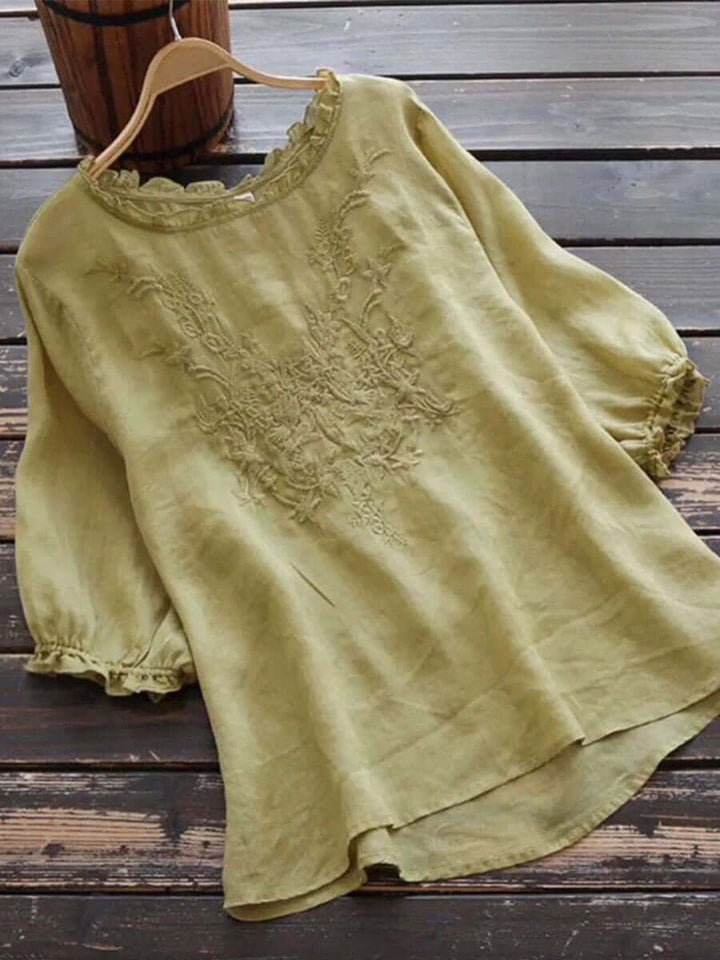Beautiful embroidered women's top; a long-sleeve, over-thigh blouse perfect for spring or fall fashion.
