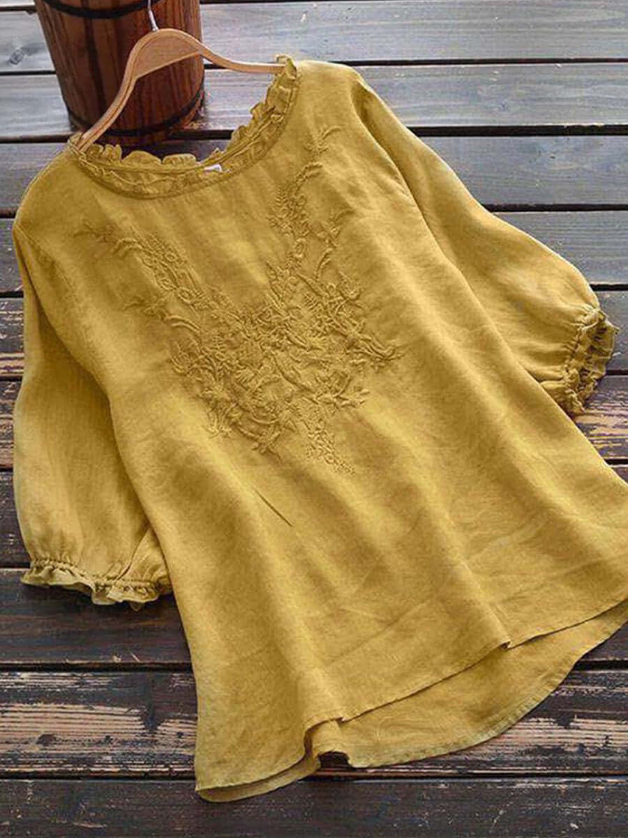 Elegant women's embroidered casual blouse, long sleeve, over thigh length, perfect for stylish everyday wear.