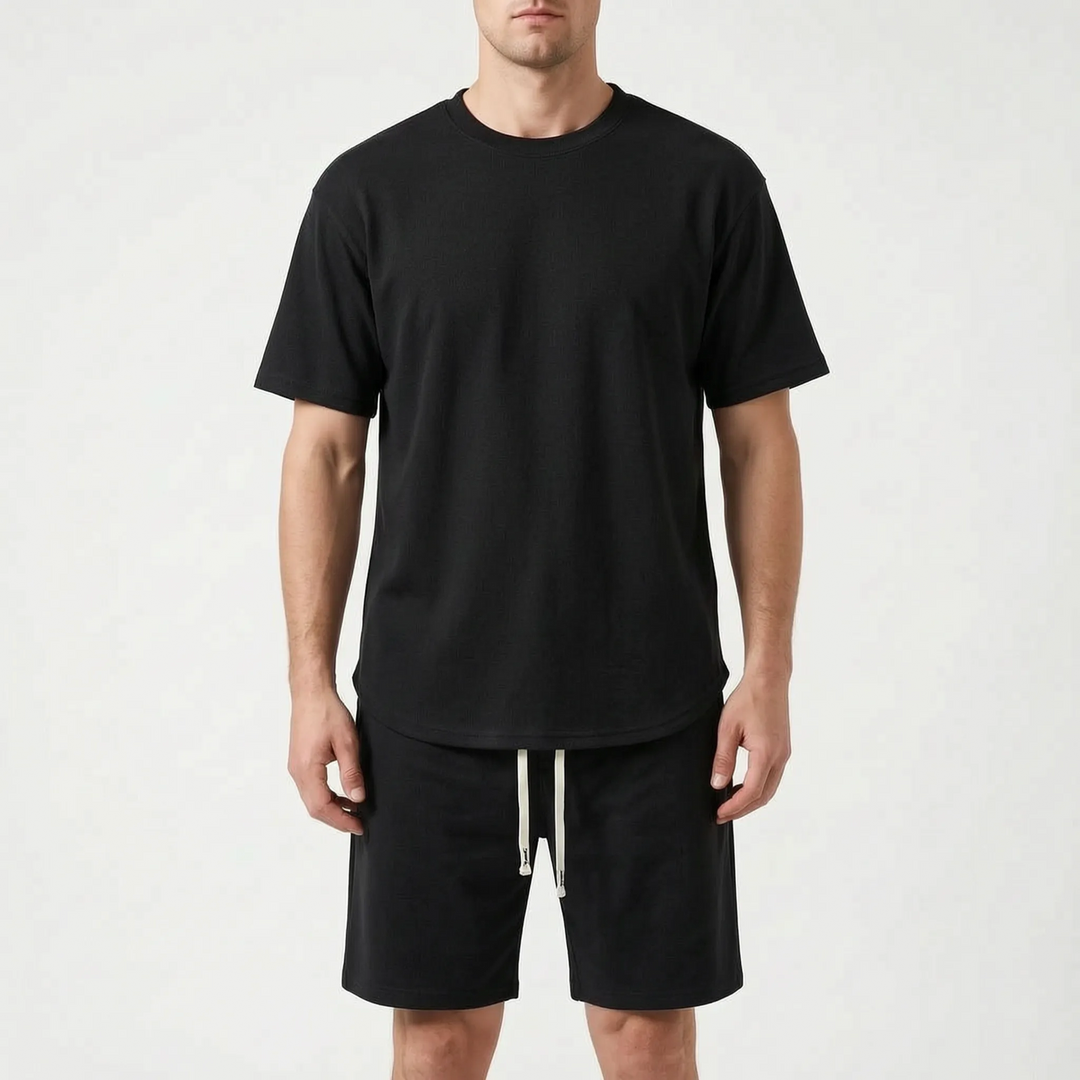 Men's comfortable casual two-piece tracksuit set. Summer loungewear active shorts and round neck top.