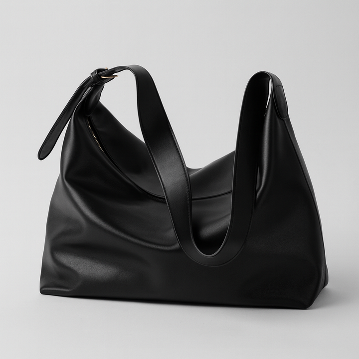 Elegant oversized faux leather tote bag for women, perfect as a stylish everyday shoulder bag.
