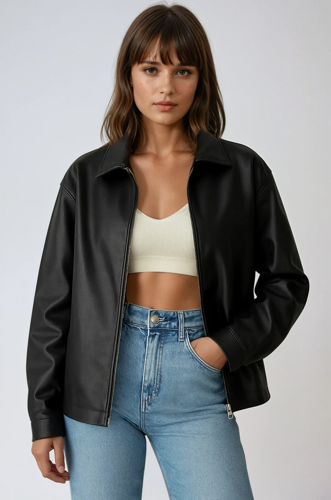 Women's chic black zip jacket, perfect for trendy layering or casual modern style. Versatile outerwear.
