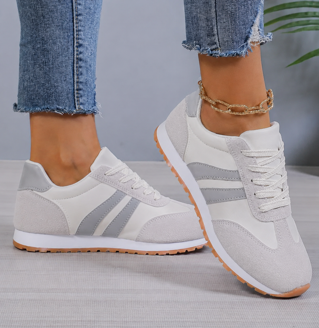 Women's retro grey lace-up casual sneakers with comfortable low-top design for everyday style & walking.