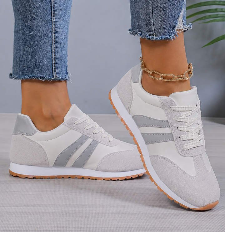 Women's retro grey lace-up casual sneakers with comfortable low-top design for everyday style & walking.
