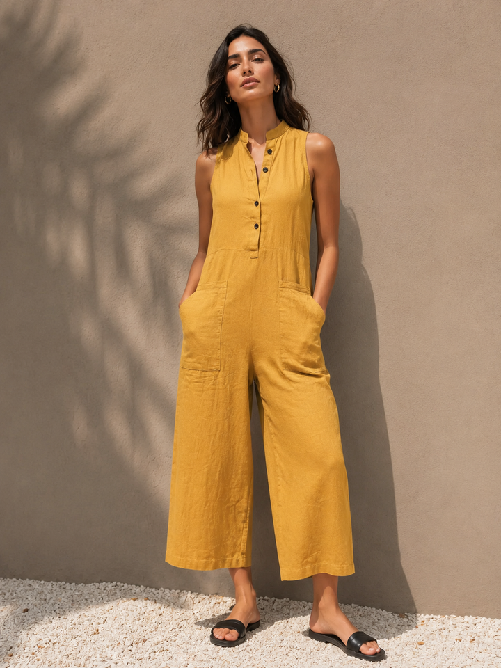 Flowy sleeveless wide-leg jumpsuit for women, ideal for stylish summer days or casual elegant events. Versatile fashion.