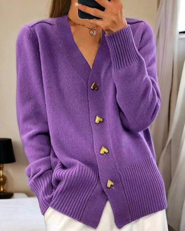 Soft knit V-neck cardigan for women, featuring a stylish button front; ideal for comfortable, chic layering.