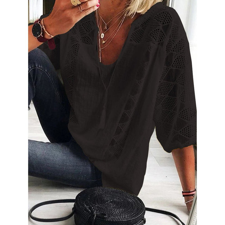 Effortless style with this women's chic accent blouse. A versatile ladies apparel top for any modern look.