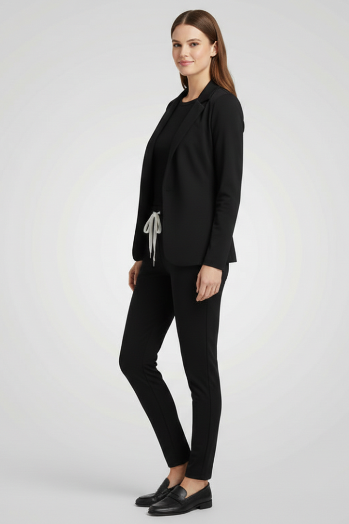 Chic women's tailored trouser set, a stylish combination of a lapel blazer and comfy elastic waist pants.