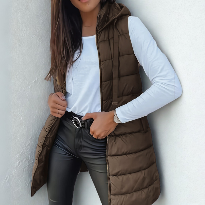 Women's hooded long puffer vest, a lightweight sleeveless option for everyday casual style.