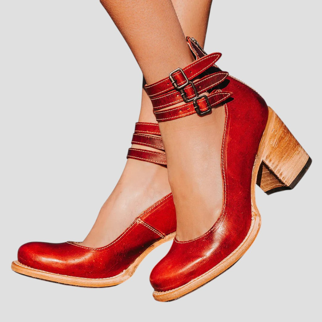 Comfortable women's heeled ankle boots with double strap detail and sturdy block heel.