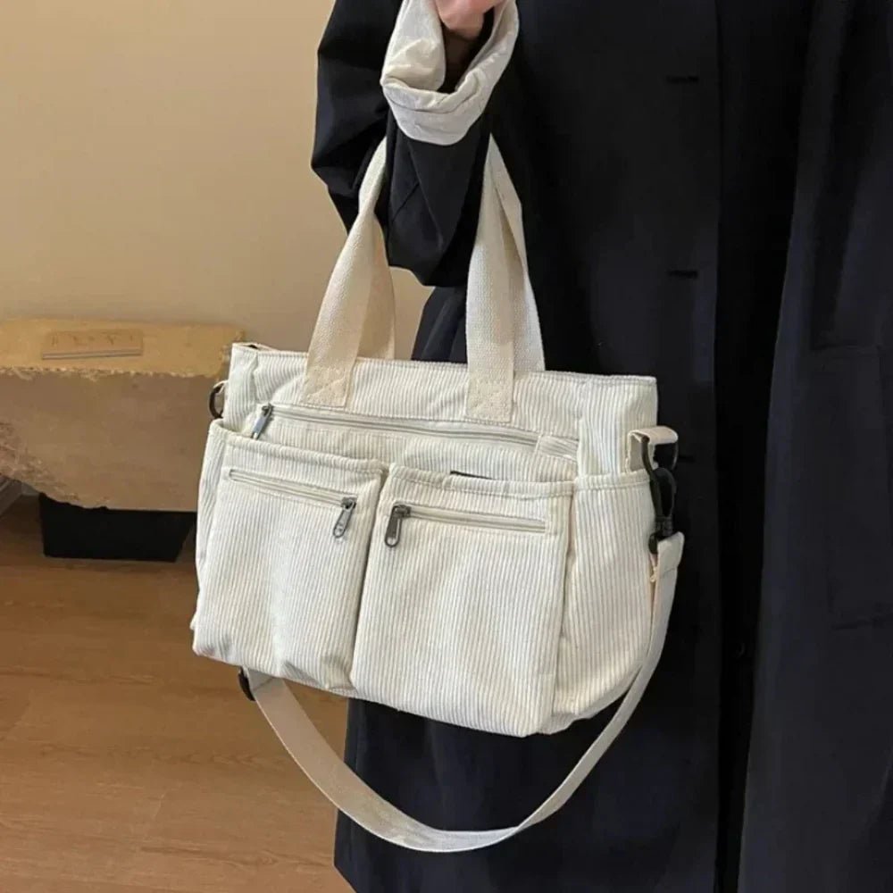 Durable corduroy multi-pocket tote bag for women. Versatile convertible design for work, travel & daily essentials.