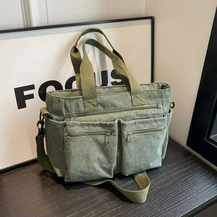 Practical women's corduroy multi-pocket tote bag. Easily converts to shoulder/crossbody, perfect for daily errands.