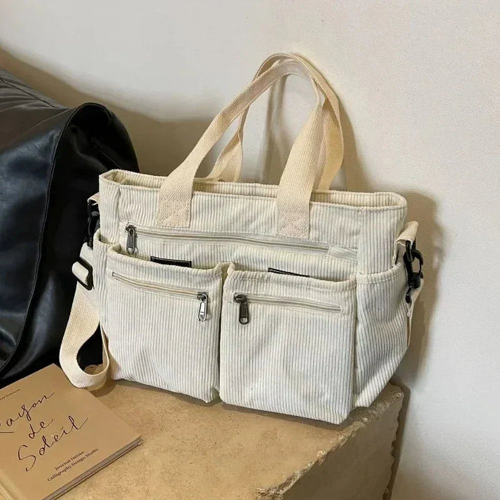 Fashionable women's corduroy tote bag. Convertible, multi-pocket design ideal for daily wear, work & travel.