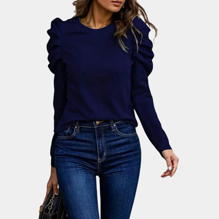 Chic black puff sleeve long sleeve blouse, crewneck, ideal for versatile elegant women's fashion.