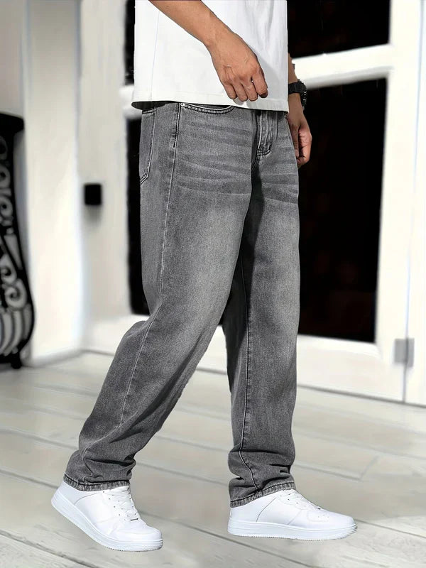 Men's loose fit baggy gray jeans for casual everyday style. Comfortable relaxed fit pants for men's fashion.