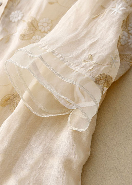 Versatile women's elegant sheer floral blouse with layered style, suitable for dressy or casual outfits.