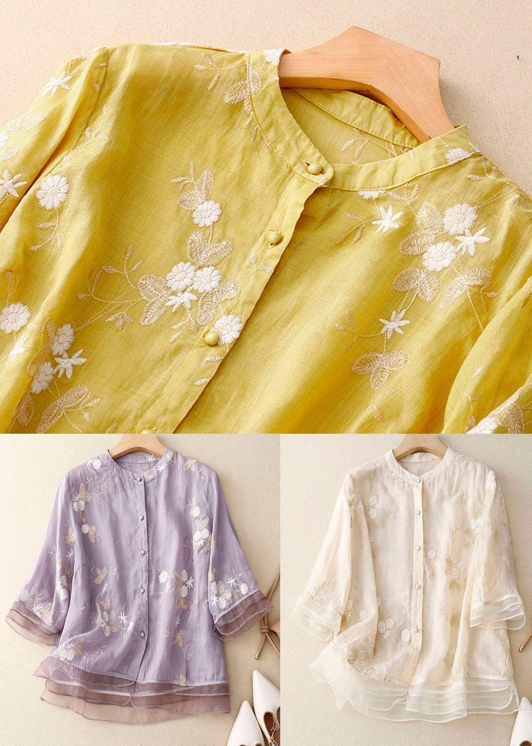 Elegant women's sheer layered blouse featuring intricate floral embroidery. A stylish and versatile long sleeve top.