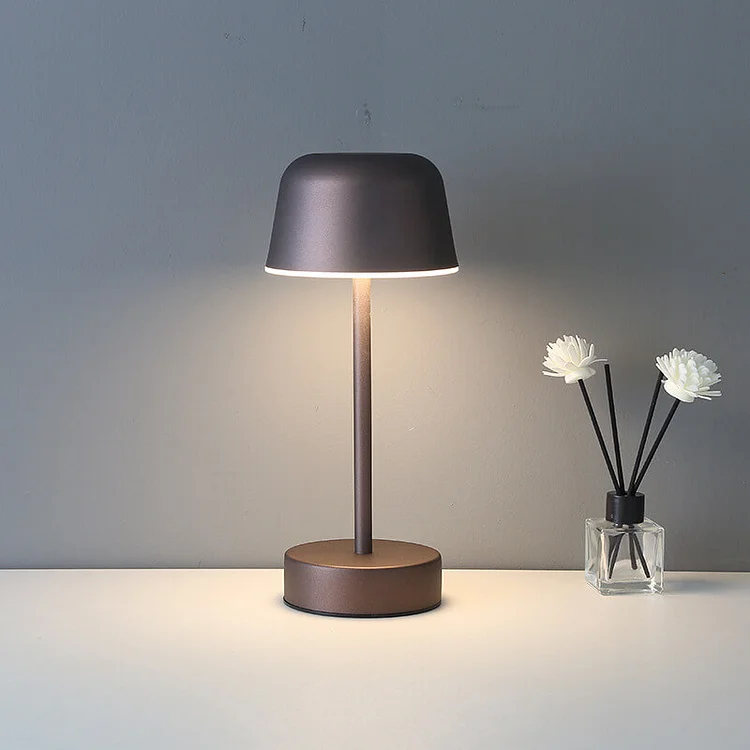 Versatile portable lamp, Nvroome, with a dimmable flare top, great for modern accent lighting.