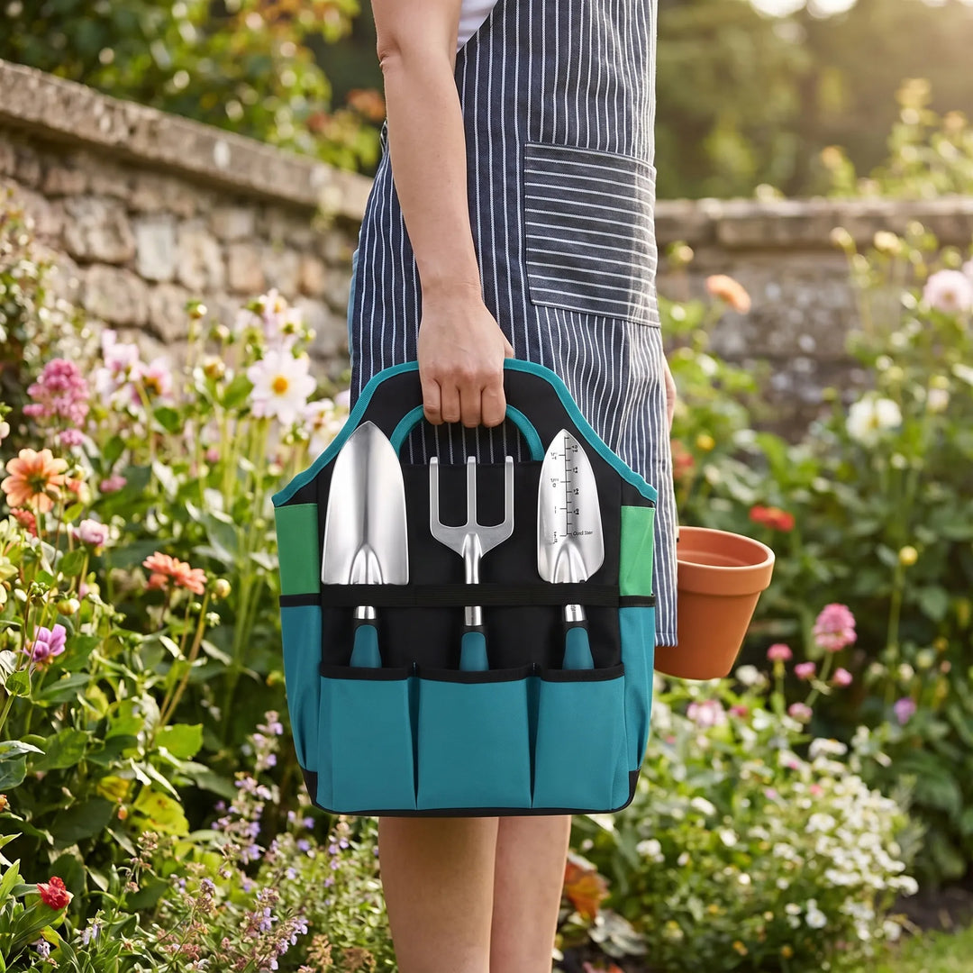 Premium 7-piece gardening tool set with tote, mat, trowel, pruner & rake. Perfect for plant care & outdoor gardening.
