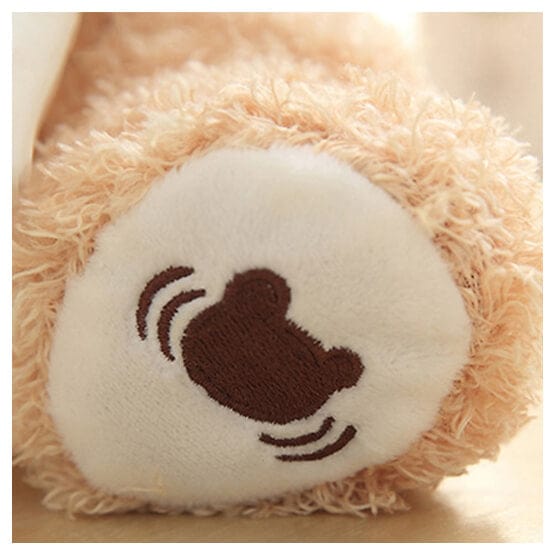 Cute talking plush bear, an educational interactive toy promoting learning through music and games for kids.