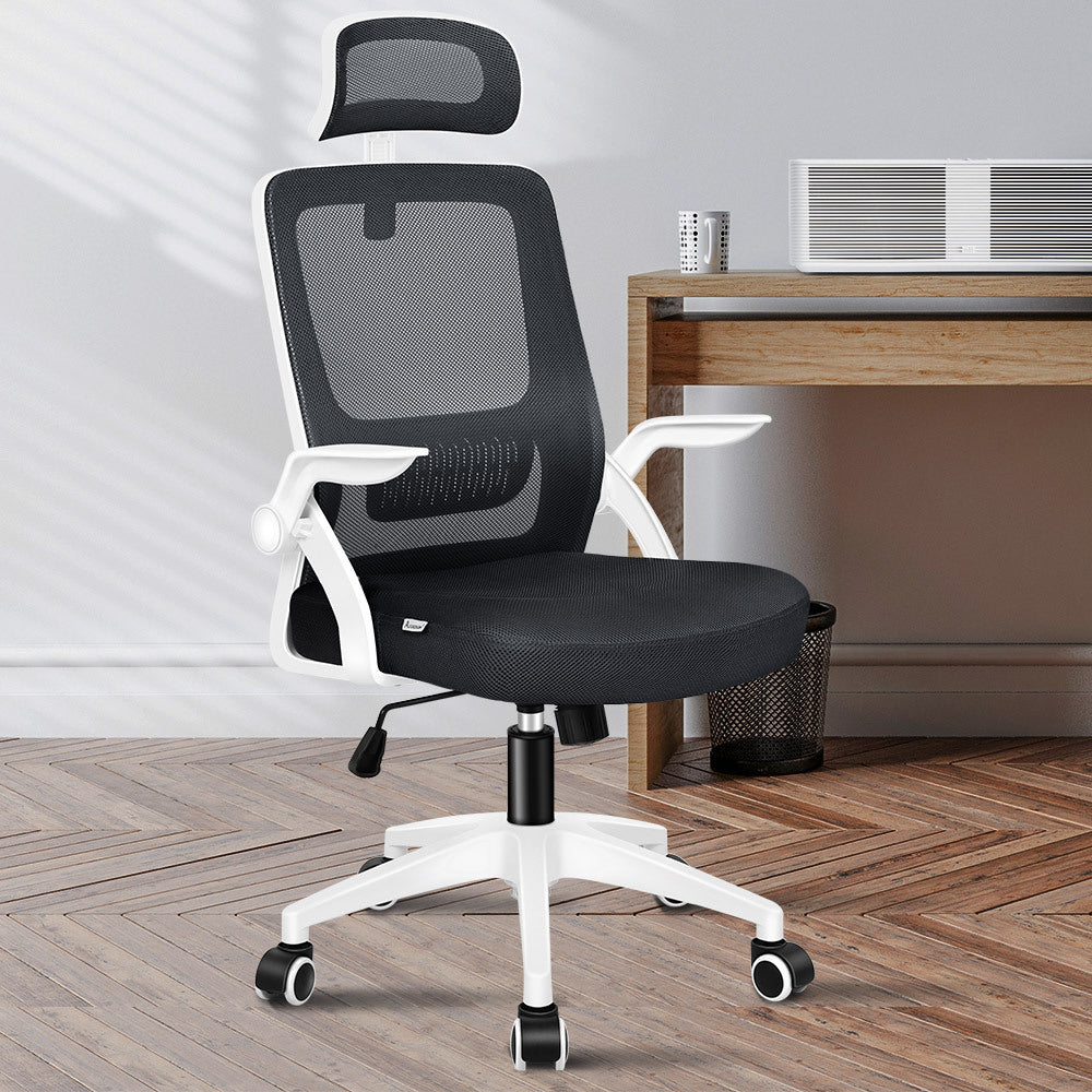 Sleek black ergonomic office desk chair with mesh back, adjustable height, headrest, and tilt control for daily use.