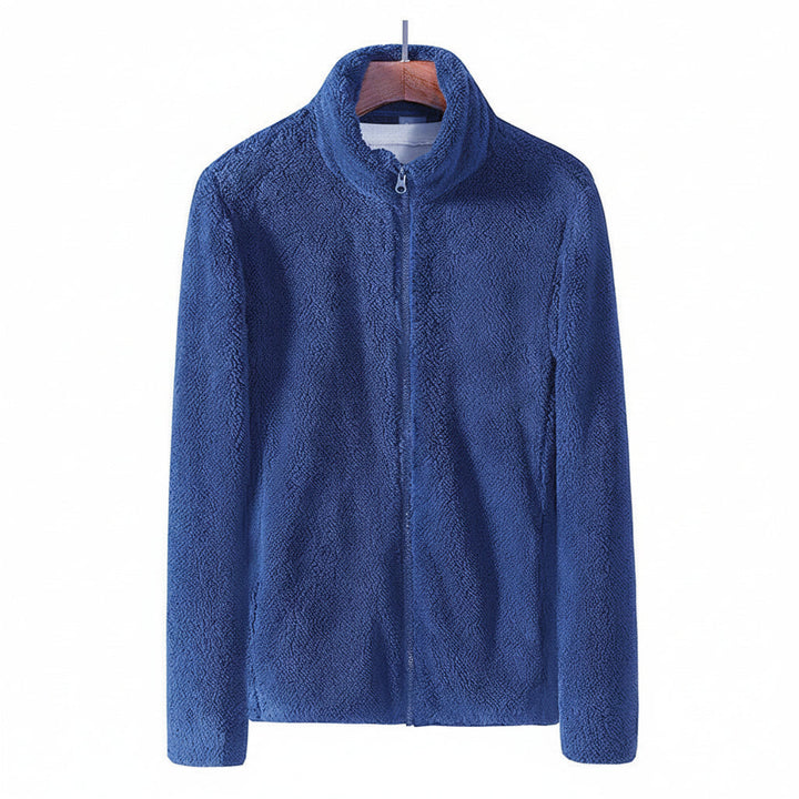 Women's comfortable plush jacket with a functional zip and high collar, essential for chilly fall weather.