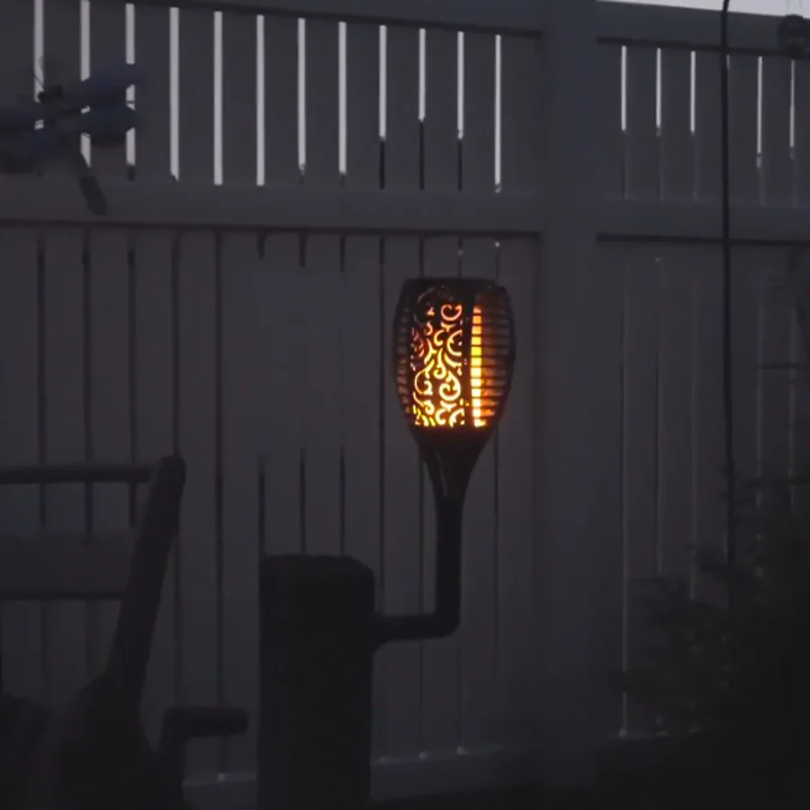 Vibrant solar LED flickering torch light, mimicking real flames. Great for outdoor living spaces & garden illumination.