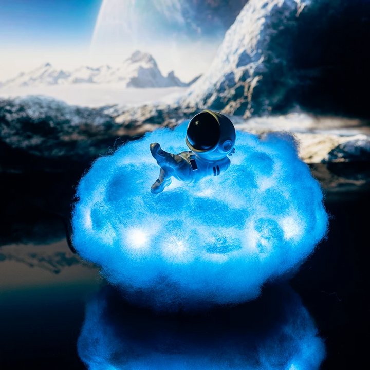 Decorative starry cloud lamp for nursery decor, featuring an astronaut. A soothing children's room night light.