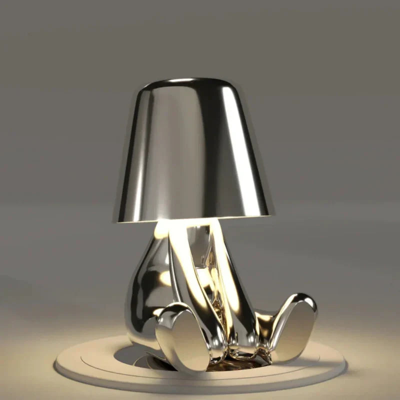 Energy-efficient LED figurine lamp, rechargeable and dimmable for ambient mood lighting.