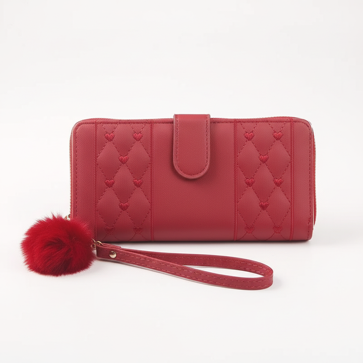 Women's practical long wallet with heart design. PU leather, includes zipper and many card slots. Stylish accessory.