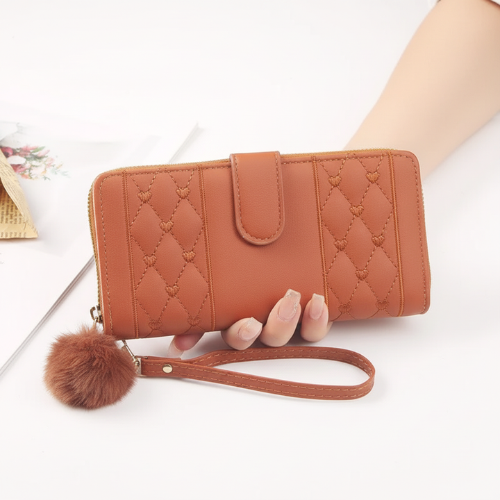 Chic women's elegant long wallet with heart embellishments. PU leather fashion accessory, ideal card holder.