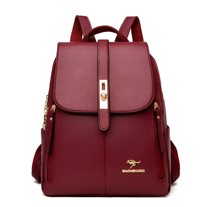 Elegant women's leather style travel daypack, sophisticated and practical for adventures.
