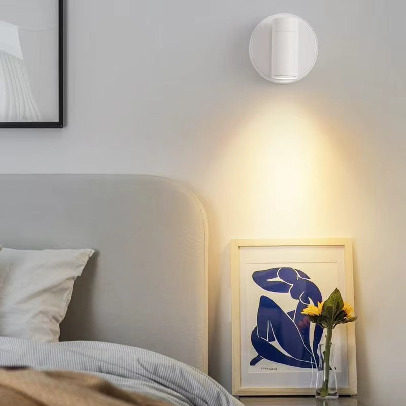 Modern wireless LED spotlight for home decor. Rechargeable, dimmable accent light, stick-on design.