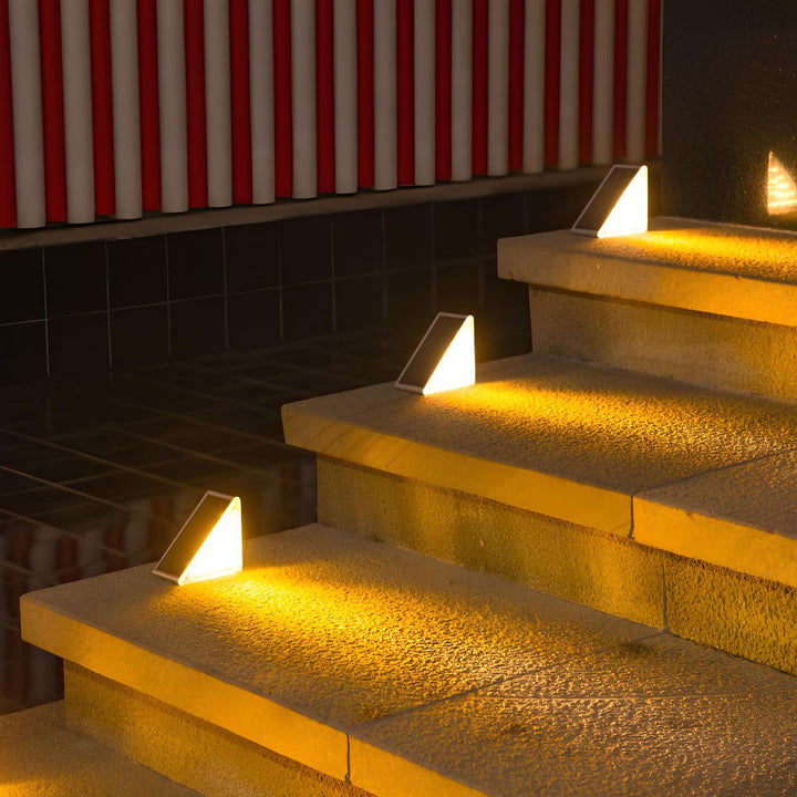 Wireless solar LED pathway lights illuminate outdoor steps & stairs. Weatherproof, energy-efficient, and durable.
