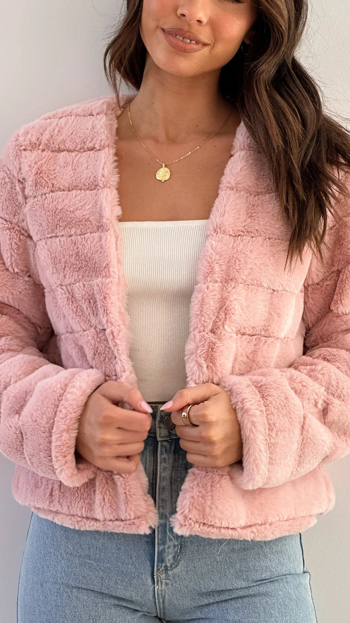 Cozy cropped zip-up bomber jacket for women. Warm, stylish outerwear, ideal for fall and winter seasons.