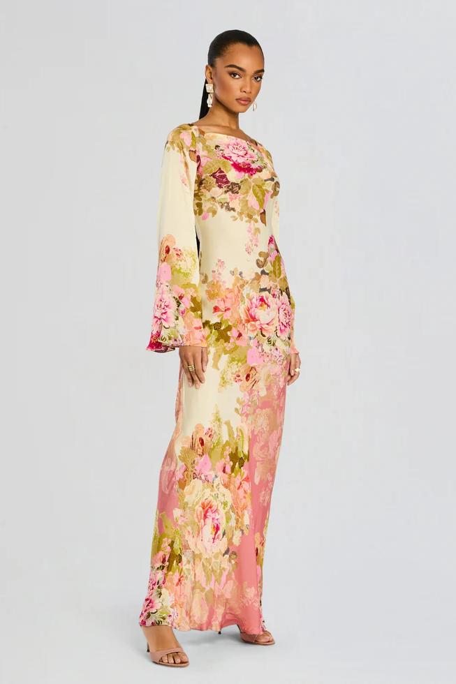 Beautiful women's floral evening gown featuring elegant bell sleeves, suitable for any special occasion.