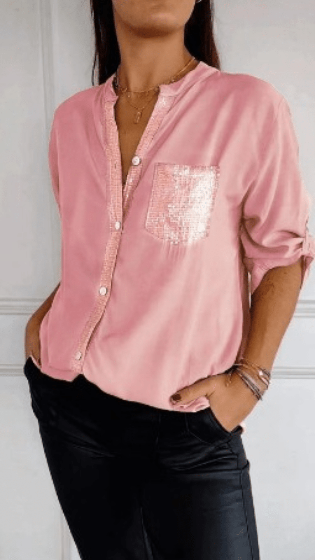 Women's elegant sequin blouse. Sparkle top for chic wear, perfect for casual glamour or evening fashion.